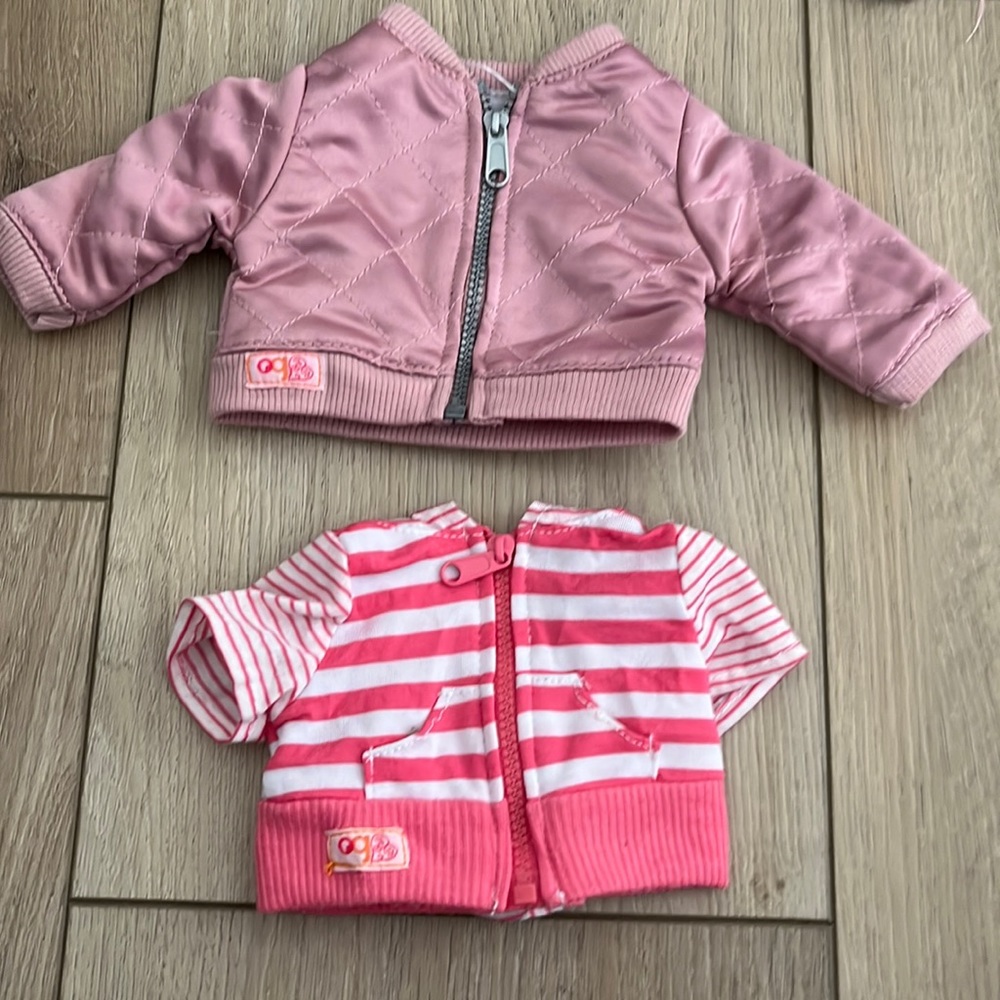 Two pink doll jackets